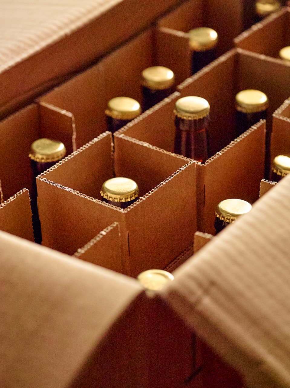 Botellas empaquetadas con separadores de cartón corrugado PREMCO